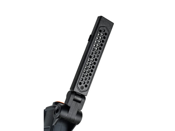 Close-up of black perforated microphone attachment.