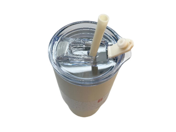 White tumbler with clear lid and straw.