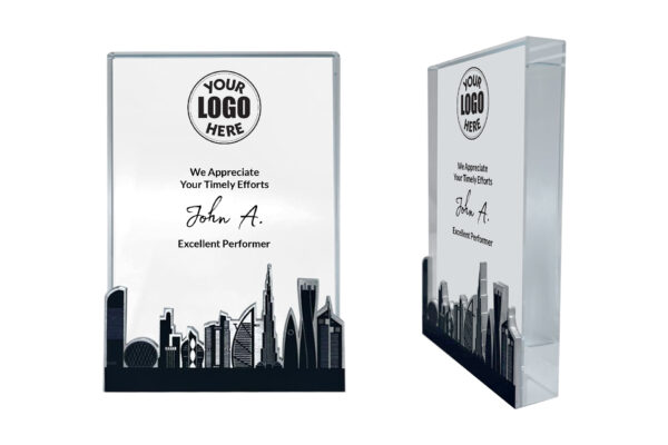 Personalized award plaque with skyscraper design.