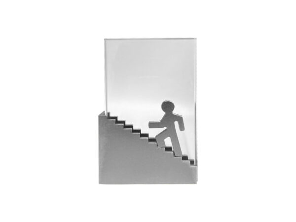 Metal figure climbing stairs trophy